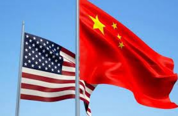 بلومبرغ: أمريكا المريضة لا تستطيع منافسة الصين